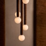 Studio Luddite Stacks Leather Discs to Form the Pell Chandelier