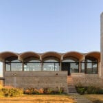 airy vaulted roofs crown robust concrete base of cristián nanzer’s residence in argentina