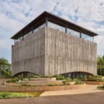 gin distillery in japan appears to float with arched openings by EA research and design office