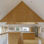 clad in grey wood, ardmore house by kwong von glinow stands in chicago