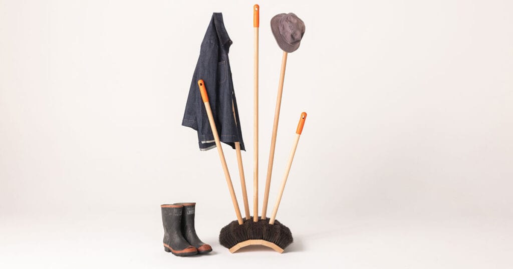 five hardware store brooms sculpt playful coatrack by clark bardsley design