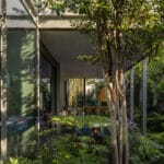 garden void softens rigid steel structure of cárpatos house in mexico city