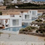 cubic volumes emerge from tinos’ rugged terrain in ‘pnoes’ hotel by aristides dallas architects