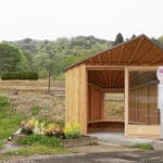 fan-shaped bus stop by ginga architects welcomes schoolchildren in rural japan