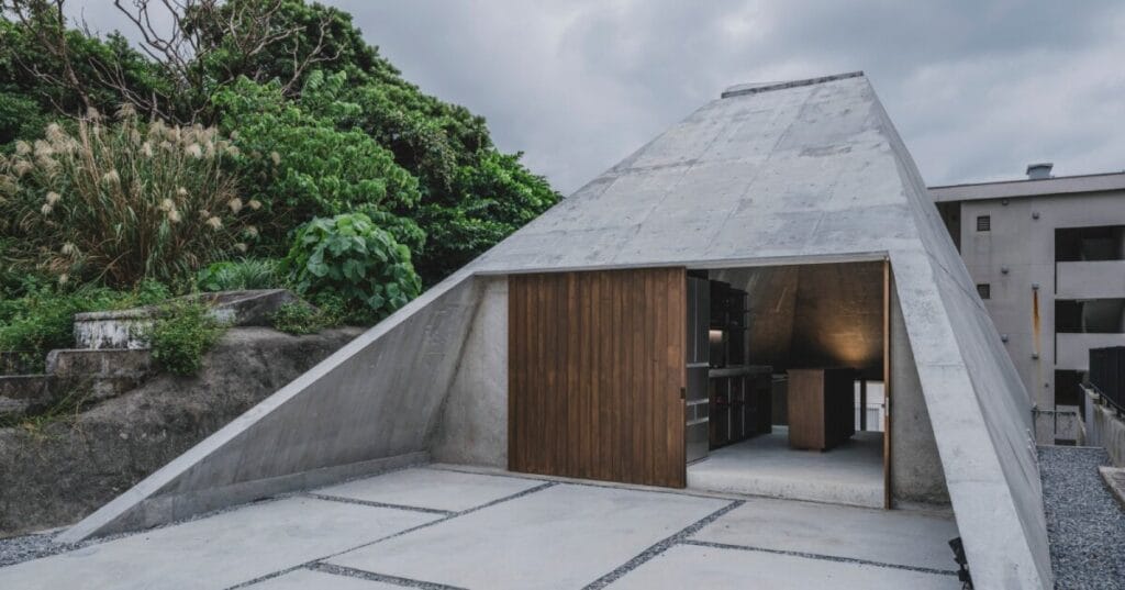 IGArchitects’ pyramid hut residence echoes concrete tombs, japan