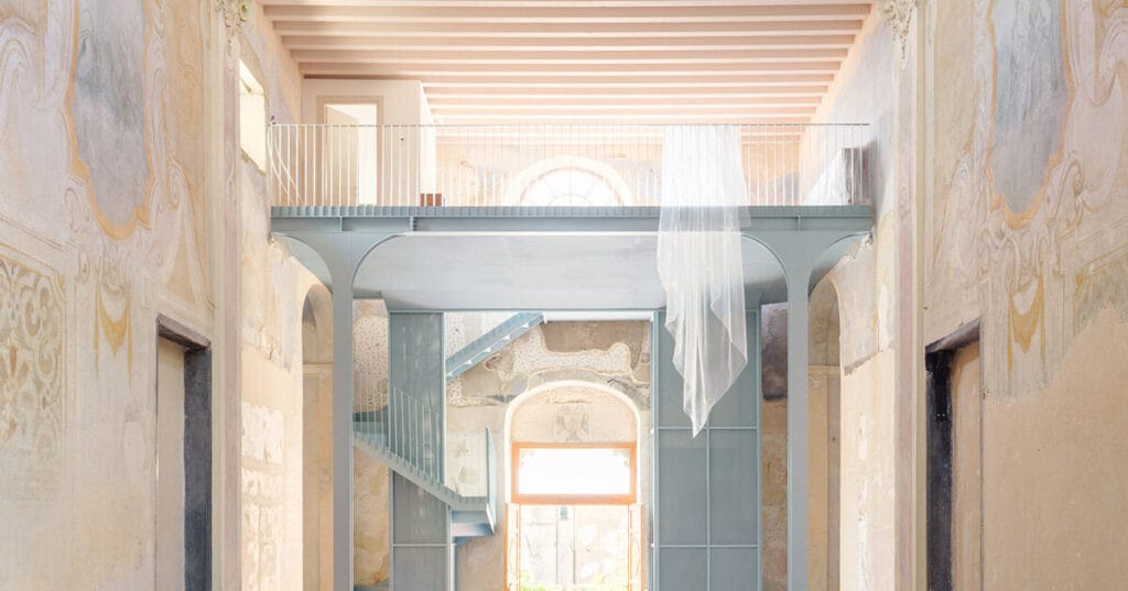 light blue steel structure by caarpa transforms historic italian church into event hall