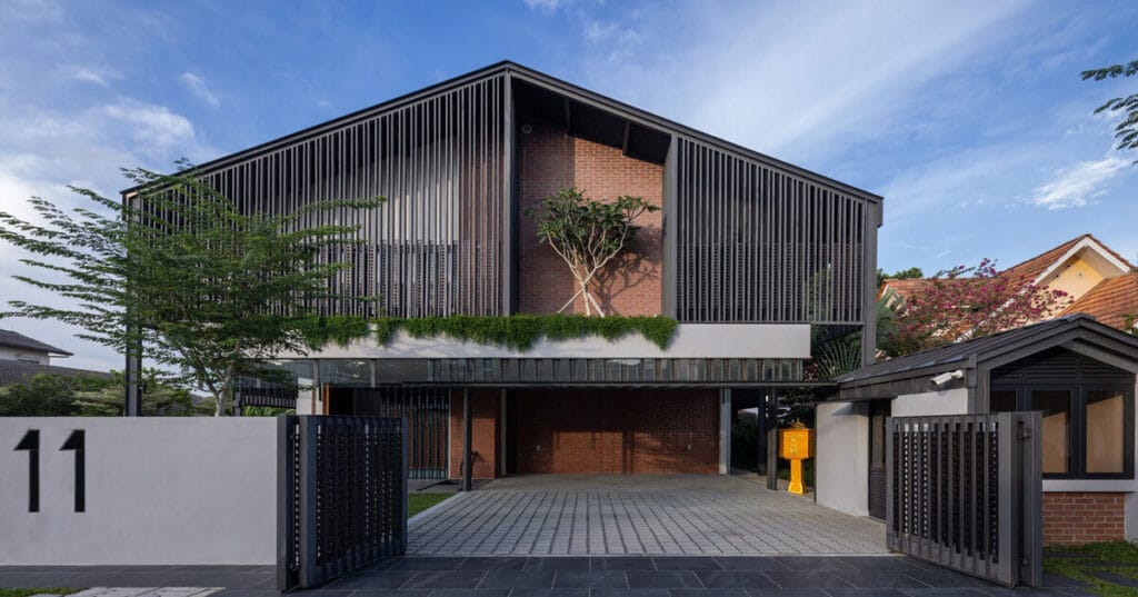 three stepped gable roofs top tebar layar house in malaysia by m j kanny
