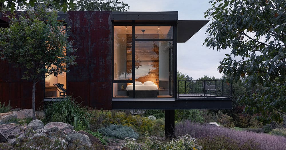 corten steel house by olson kundig overlooks blue ridge mountains