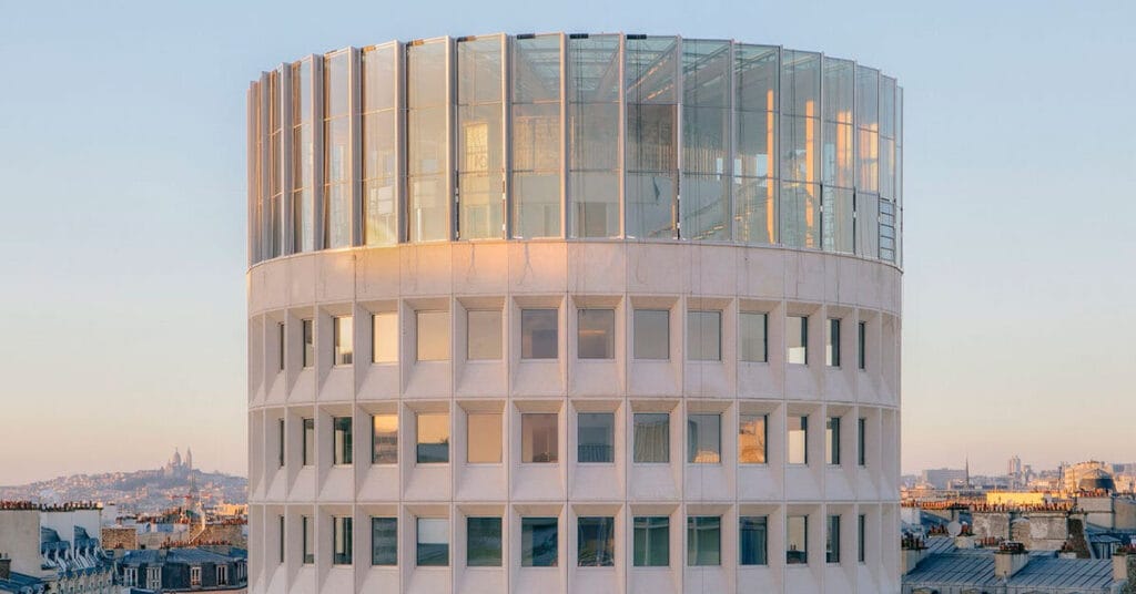 glass crown by maud caubet architectes extends racine office tower in paris