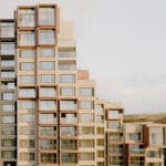 BVN restores sydney’s brutalist sirius building with copper balconies