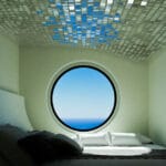 nakagin capsules transform into modular seaside lodging in japan