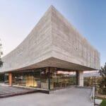 Oak House Is a Concrete and Glass Home With Floating Levels