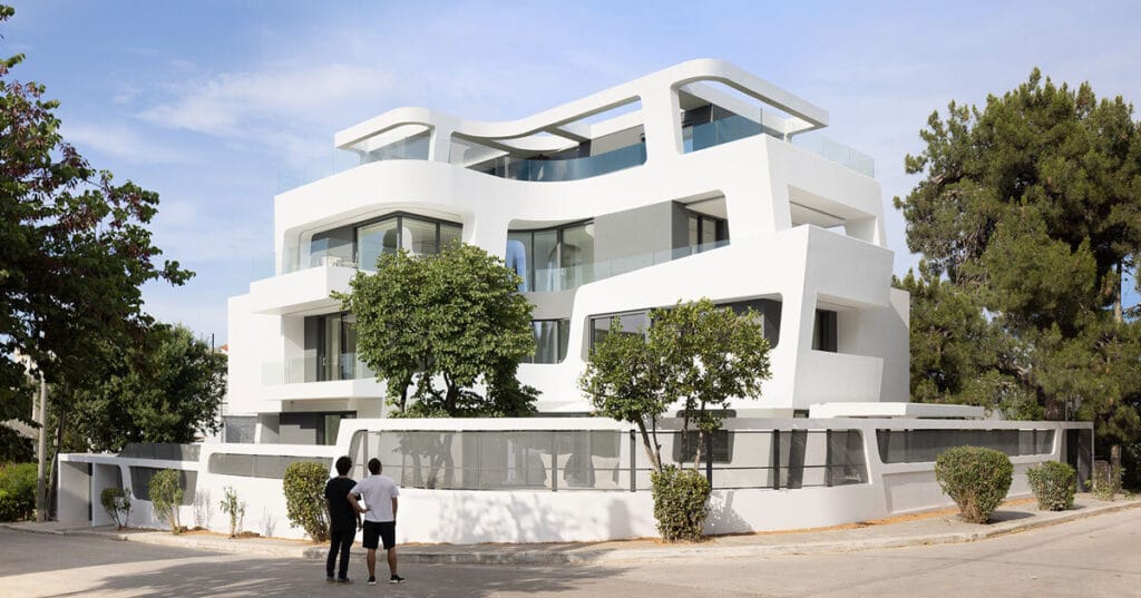 sculptural ribbon-like volumes compose dual residence in athens