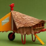 timber shingles wrap hen-shaped chicken coop in UK’s lake district