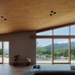 hybrid live-work spaces compose stone residence by FEDL in japanese hillside