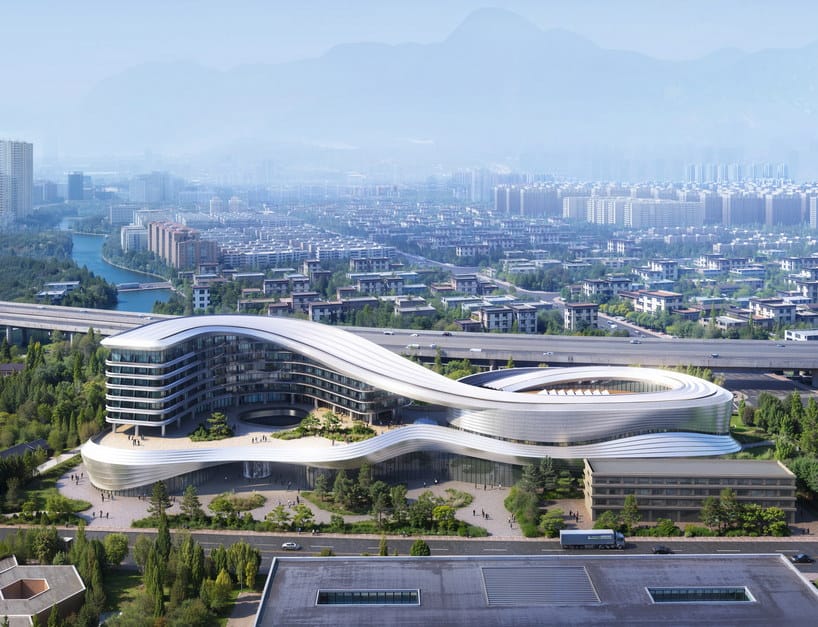 aluminum skin envelops curved exhibition center and hotel by POA