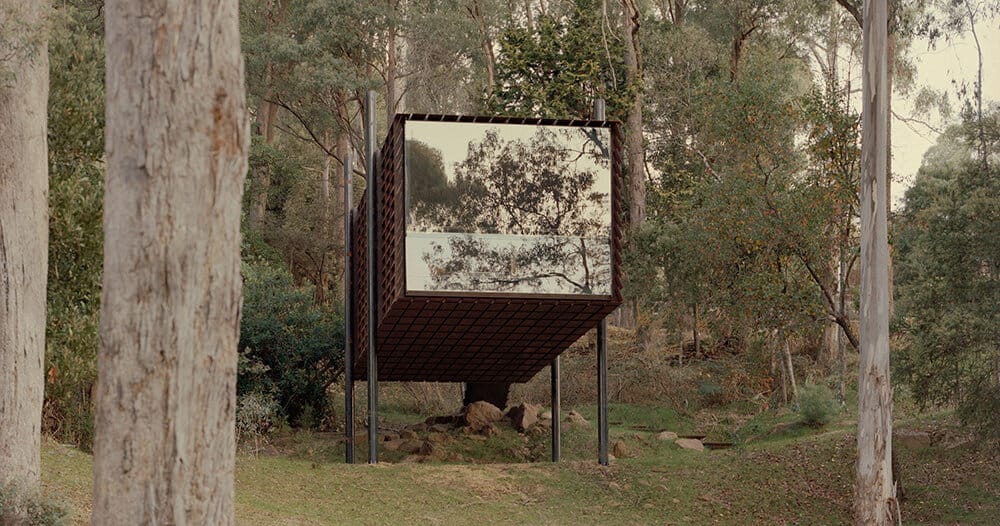 steel slats filter sunlight into robbie walker’s sawmill treehouse