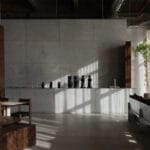 shell+core’s cafe in abu dhabi embraces wabi-sabi and brutalism