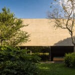 studio MK27’s monolithic concrete house unfolds onto tropical garden in são paulo
