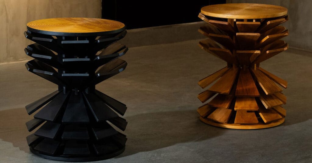 salù iwadi studio layers spiraling wooden fins to form zangbeto side table